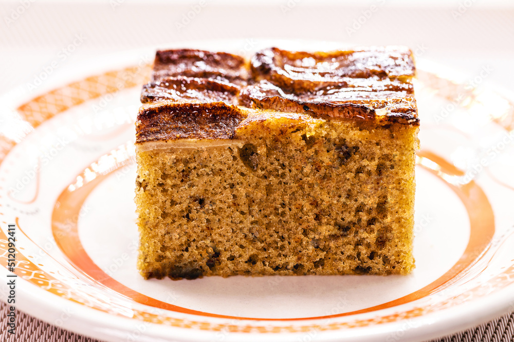 large slice of homemade vegan banana cake, healthy dessert large slice of homemade vegan banana cake, healthy dessert