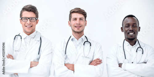 three successful physician therapists standing together