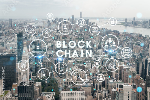 Aerial panoramic city view of Lower Manhattan, Midtown, Downtown, Financial area, West Side at day time, NYC, USA. Decentralized economy. Blockchain, cryptography and cryptocurrency concept, hologram