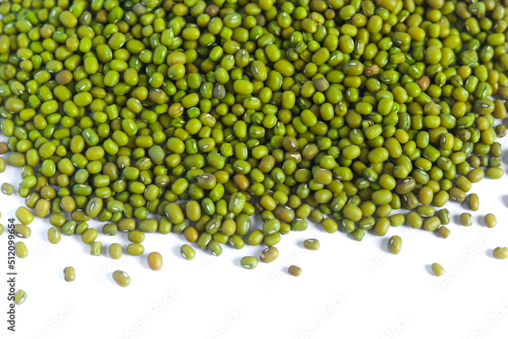 Green uncooked mung beans isolated on white background. Vegetarian healthy organic food diet. Raw green grains.