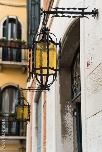 old yellow street lamp in Venice, Italy 