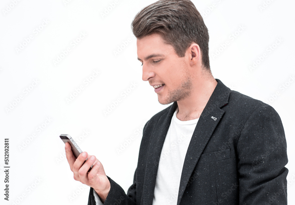 close up.smiling businessman looking at the smartphone screen close up.smiling businessman looking at the smartphone screen