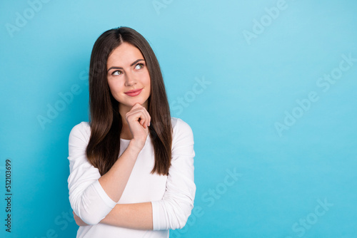 Photo of cute dreamy lovely dreamy lady look blank space brainstorming isolated on blue color background © deagreez