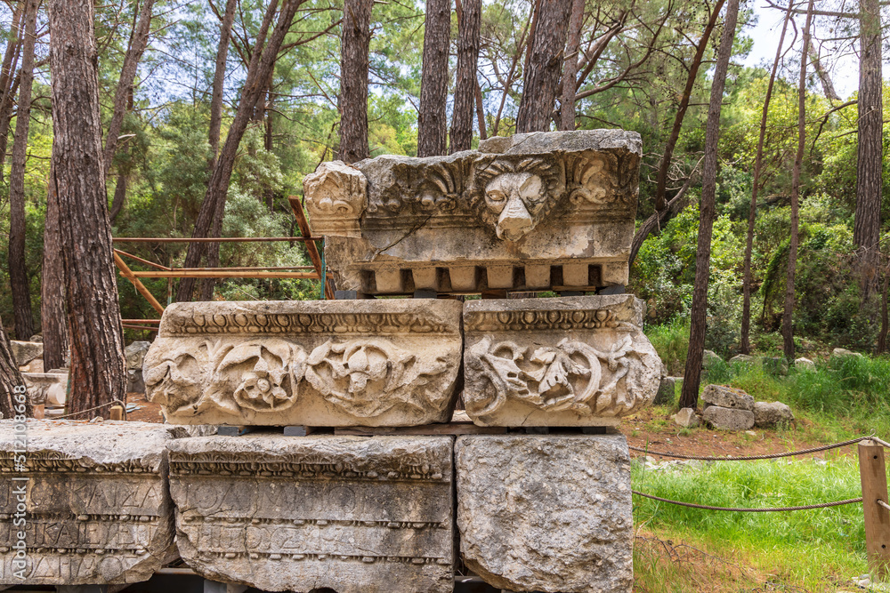 Carved detail of Hadrians Gate plinth by the South Harbour in the ancient city of Phaselis in Turkey.