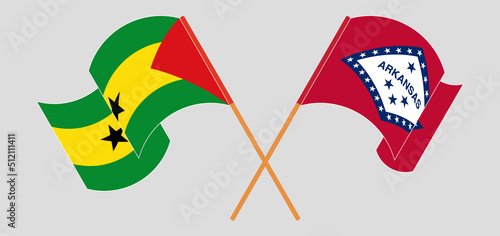 Crossed and waving flags of Sao Tome and Principe and The State of Arkansas