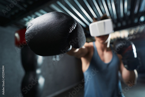 Adult male athlete boxing in virtual reality © Viacheslav Yakobchuk