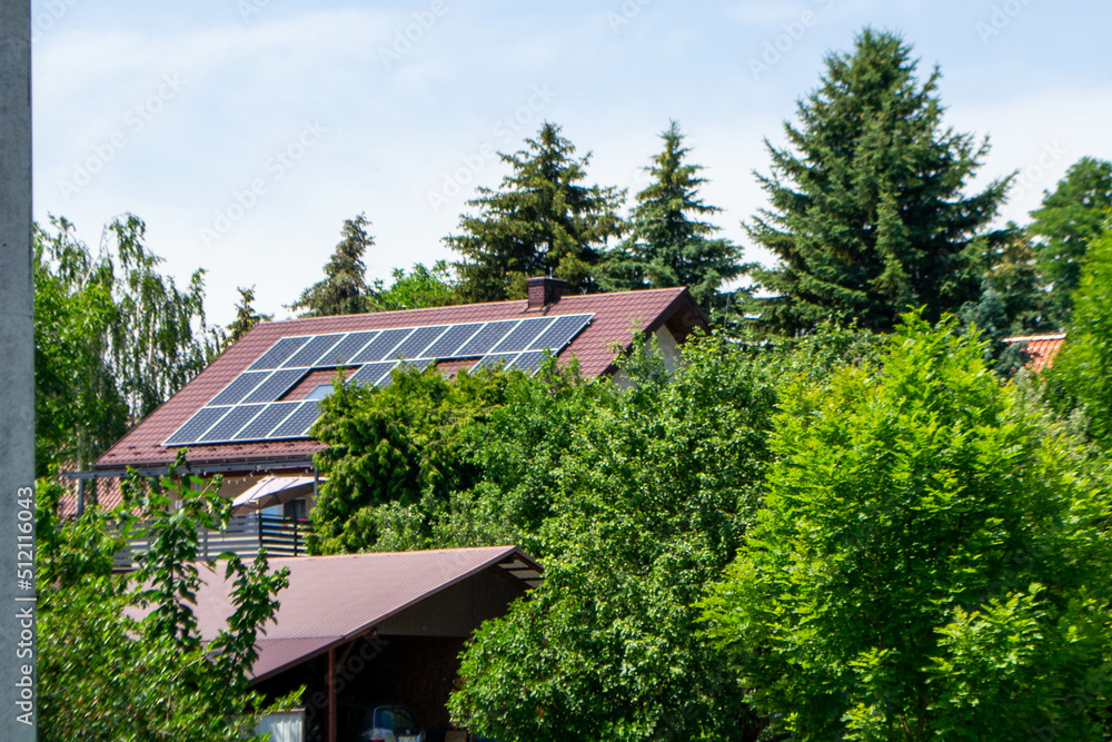 Historic farm house with modern solar panels on roof and wall High quality photo Historic farm house with modern solar panels on roof and wall High quality photo