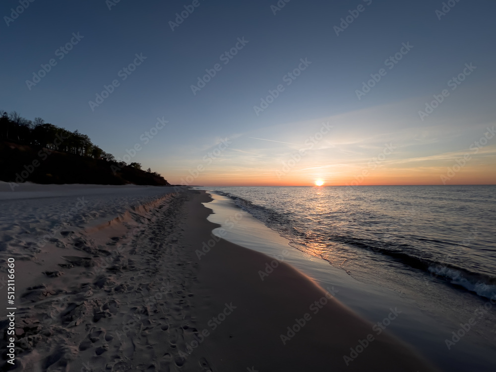 Sunset on the beach on the Baltic Sea in Jastrzebia Gora in Poland