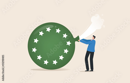 European recession. Inflation in the euro area. The bubble that is bursting from economic poisoning. Businessman tries to seal a bubble balloon with a European star symbol.