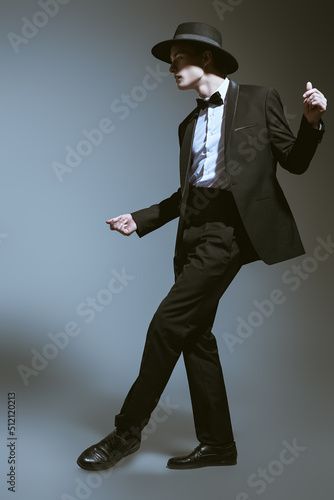 dancing man in suit © Andrey Kiselev