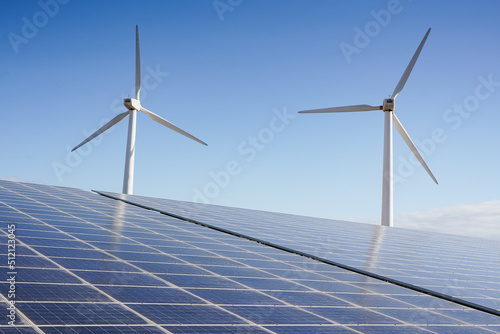 Solar panel and windmill farm - Alternative energy photo