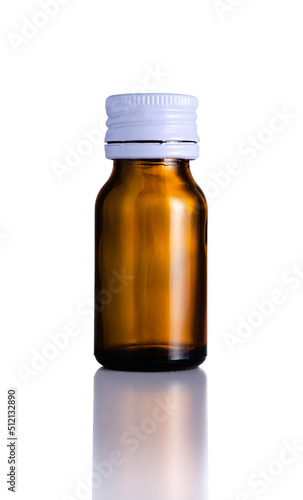 Empty brown medicine pill glass Bottle and reflection isolated on white background, Suitable for Mock up creative graphic design, clipping path.