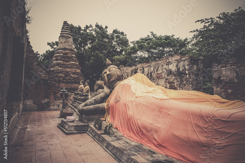 Obraz na plátně Ancient Reclining Buddha statue at Wat Phutthaisawan in Sampao Lom subdistrict, Phra Nakorn Sri Ayutthaya ,Thailand