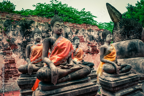 Obraz na płótnie Ancient Buddha statues in Vihara of the Reclining Buddha,Wat Phutthaisawan,Sampao Lom subdistrict, Phra Nakorn Sri Ayutthaya,Thailand