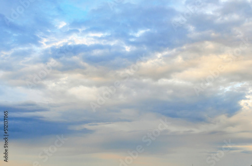 Sky in the blue clouds at sunset in evening © romankrykh