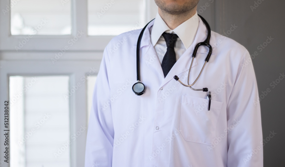 male doctor with stethoscope and white coat male doctor with stethoscope and white coat