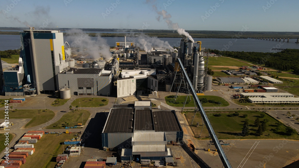 4K 60 fps Aerial shot of environmental pollution in botnia paper mill factory in Fray Bentos, Uruguay, South America