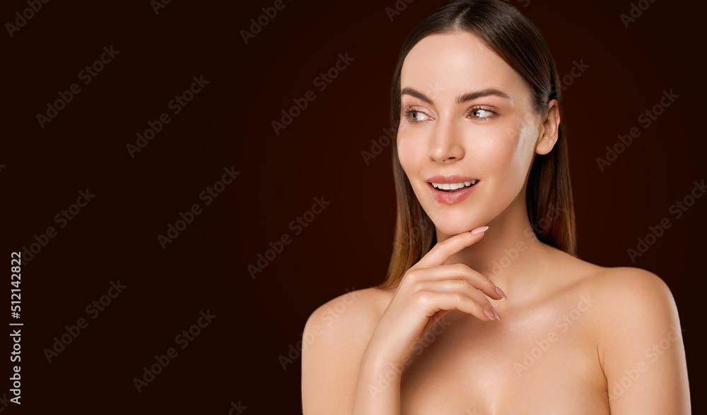 Attractive woman with naked shoulders looking at side Attractive woman with naked shoulders looking at side