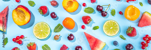 Fototapeta Naklejka Na Ścianę i Meble -  Summer vitamin food concept, various fruit and berries watermelon peach mint plum apricots blueberry strawberry currant, creative flat lay on light blue background top view copy space
