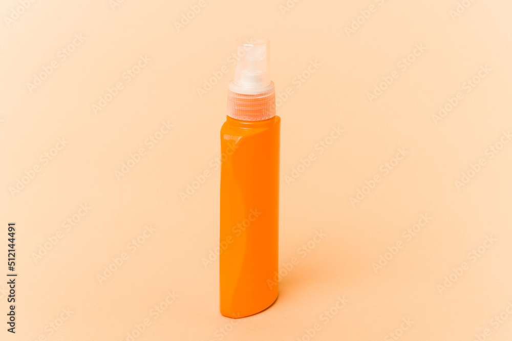 Sun cream isolated on beige background Sun cream isolated on beige background