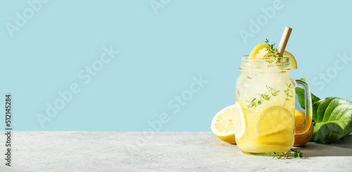 Quadro su tela Banner. Summer drink with lemon and rosemary close up, copy space