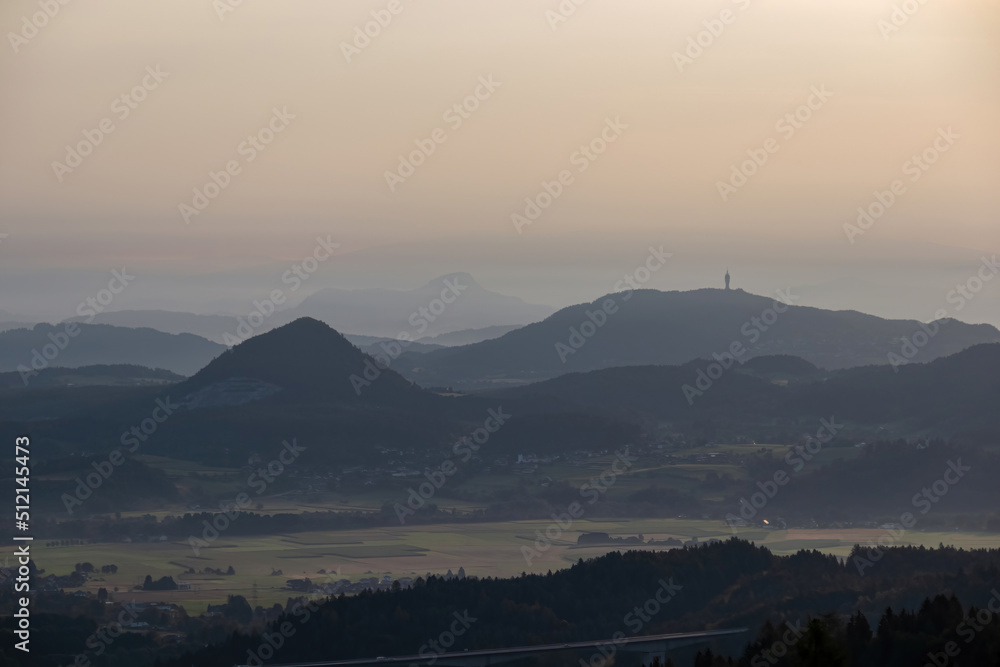 Scenic morning view from Ferlacher Spitze on Pyramidenkogel and Kathreinkogel in the Karawanks in Carinthia, Austria. Borders between Austria, Slovenia, Italy. Karawanks motorway, highway A2. Rosental