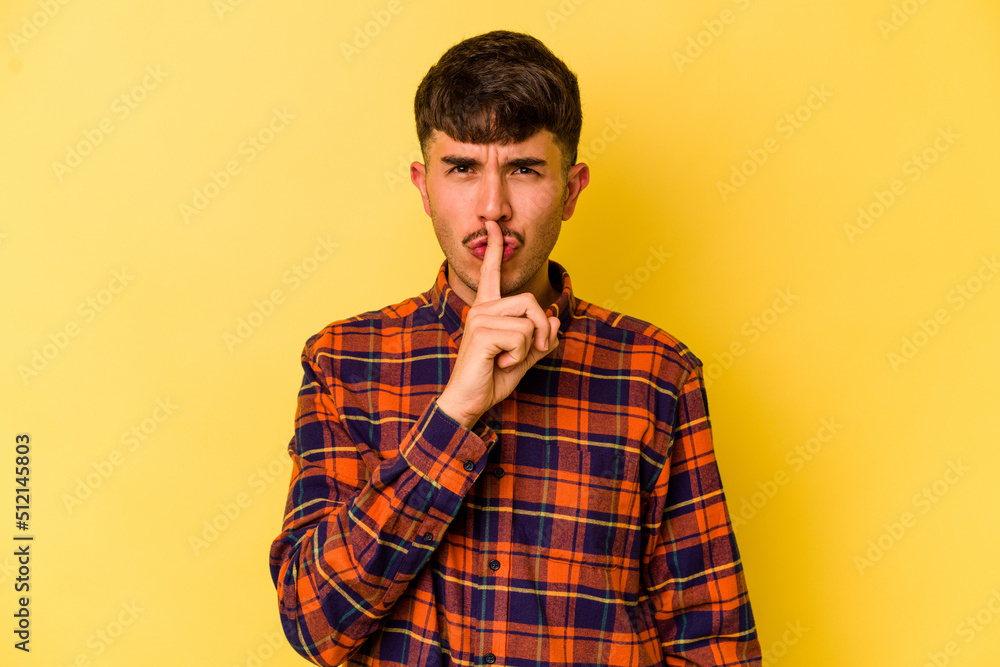 Young caucasian man isolated on yellow background thinking and looking up, being reflective, contemplating, having a fantasy. Young caucasian man isolated on yellow background thinking and looking up, being reflective, contemplating, having a fantasy.