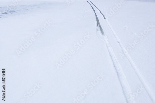 Stampa su tela track from a skier on fresh snow, water appears on the track