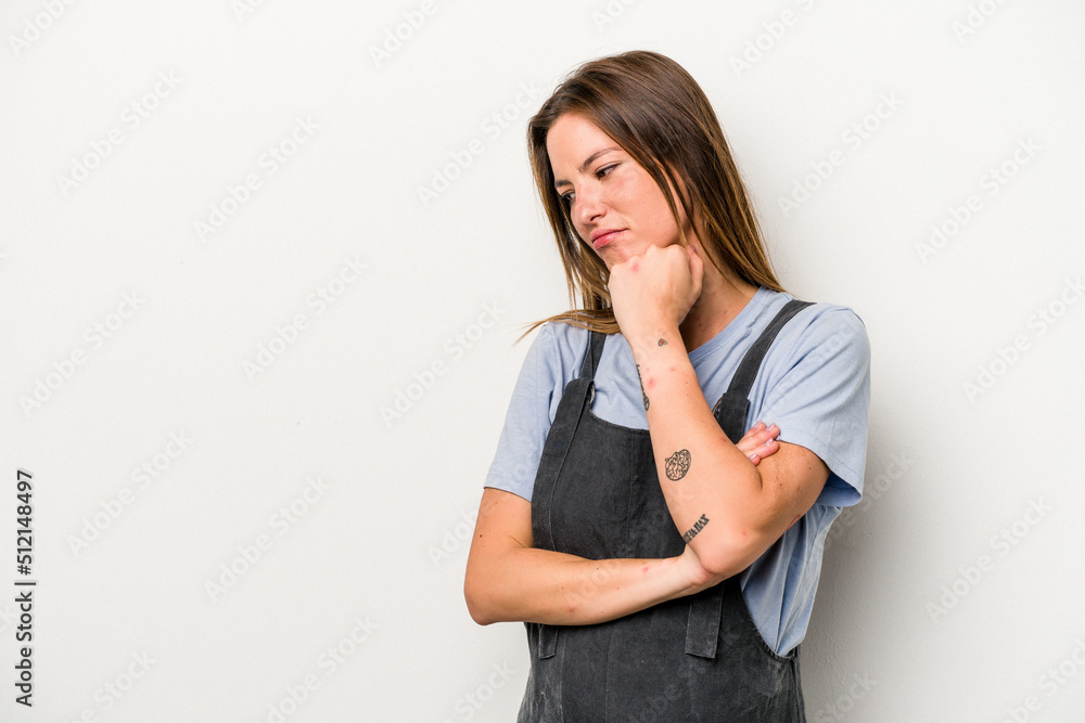 Young caucasian pregnant woman isolated on white background who feels sad and pensive, looking at copy space. Young caucasian pregnant woman isolated on white background who feels sad and pensive, looking at copy space.