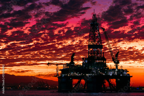 Silhouette of Oil Drilling Rig in Guanabara Bay in Rio de Janeiro, Brazil With Dramatic Sunset Sky