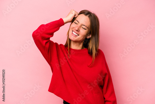 Young caucasian pregnant woman isolated on white background celebrating a victory, passion and enthusiasm, happy expression. © Asier
