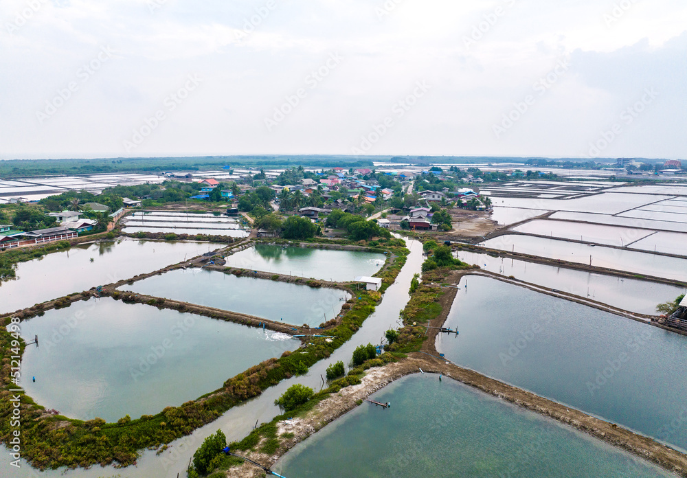 Fototapeta premium Aerial view of Salt farms in Phetchaburi province, Thailand