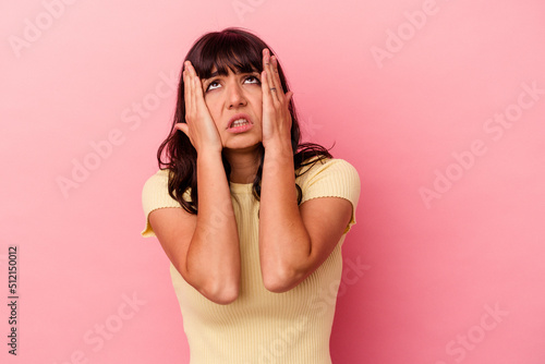 Tablou pe pânză Young caucasian woman isolated on pink background whining and crying disconsolately