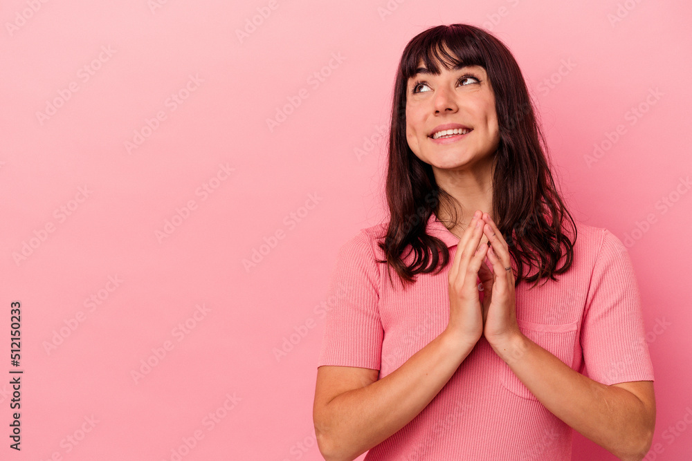 Young caucasian woman isolated on pink background making up plan in mind, setting up an idea. Young caucasian woman isolated on pink background making up plan in mind, setting up an idea.