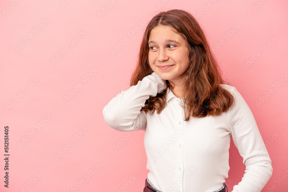 Little caucasian girl isolated on pink background touching back of head, thinking and making a choice. Little caucasian girl isolated on pink background touching back of head, thinking and making a choice.
