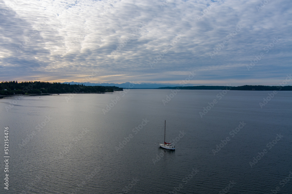 Sailboat on the Puget Sound at sunset in June 2022 