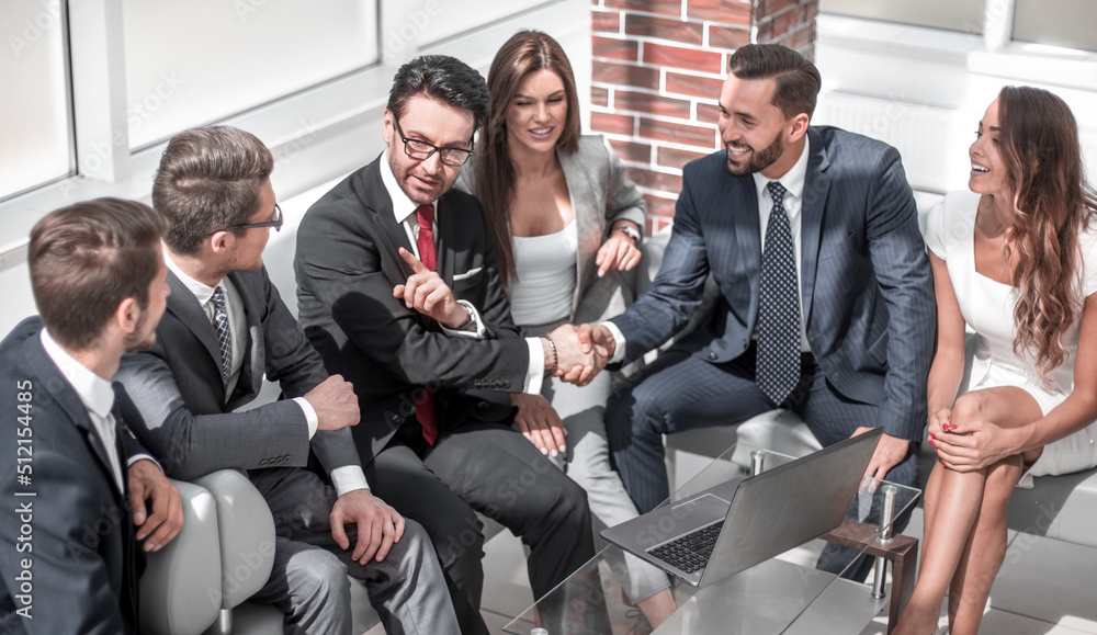 business colleagues greet each other at an informal meeting business colleagues greet each other at an informal meeting
