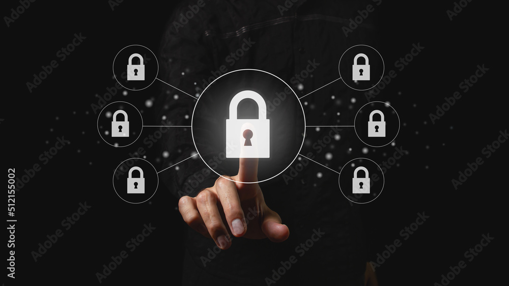 Businessman chooses the padlock icon. Cybersecurity and privacy concepts to protect data. Lock icon, technology for secure storage of information. Businessman chooses the padlock icon. Cybersecurity and privacy concepts to protect data. Lock icon, technology for secure storage of information.