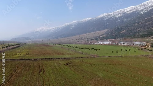 Arerial Shot Of Wonderful View Of Beqaa Valley With Snow On Top Of High Mountains, Lebanon photo