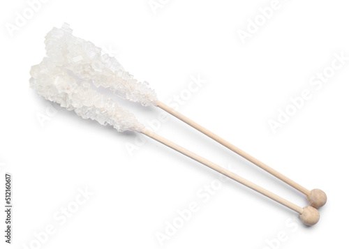 Wooden sticks with sugar crystals isolated on white  top view. Tasty rock candies