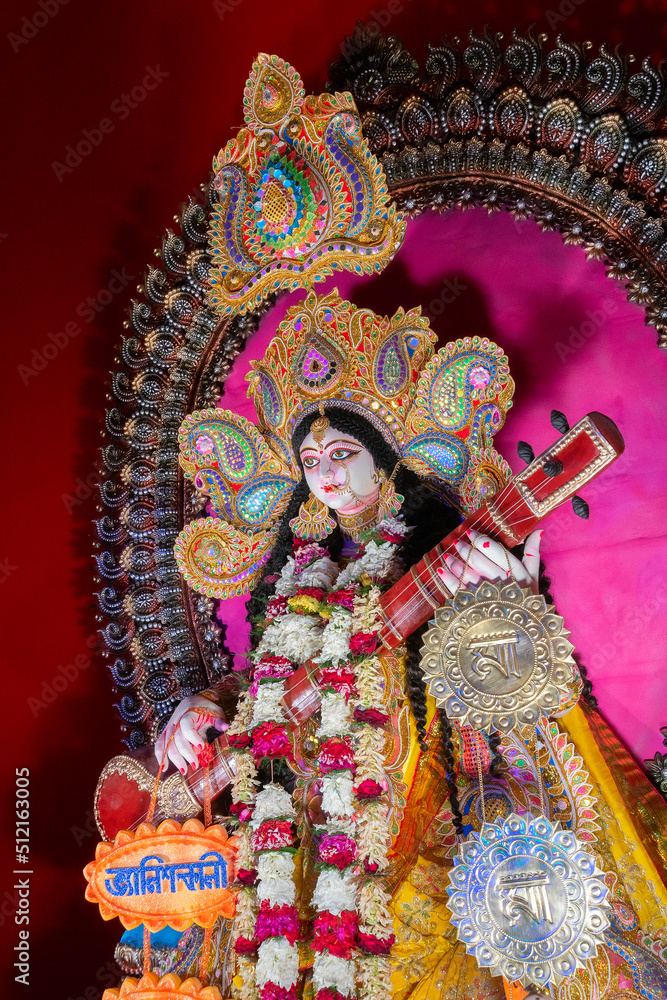 Kolkata,West Bengal,India - 10th February 2019 : Idol of Goddess Saraswati with veena, a musical instrument being worshipped. Hindu goddess of knowledge, music, art, wisdom, and learning.