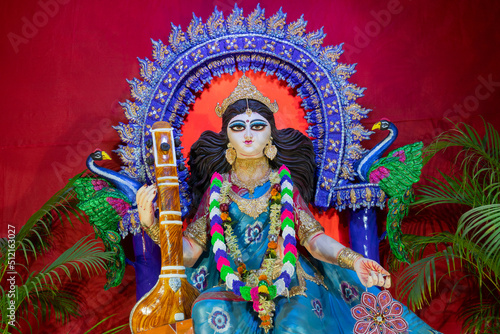 Idol of Goddess Saraswati at Kolkata, West Bengal, India. Saraswati is Hindu goddess of knowledge, music, art, wisdom, and learning. Worshipping is done to get divine blessing to achieve excellence.