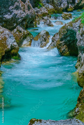 Fototapeta Naklejka Na Ścianę i Meble -  The beautifull emerald green river Soca in the middle of the triglav national park, Slovenia