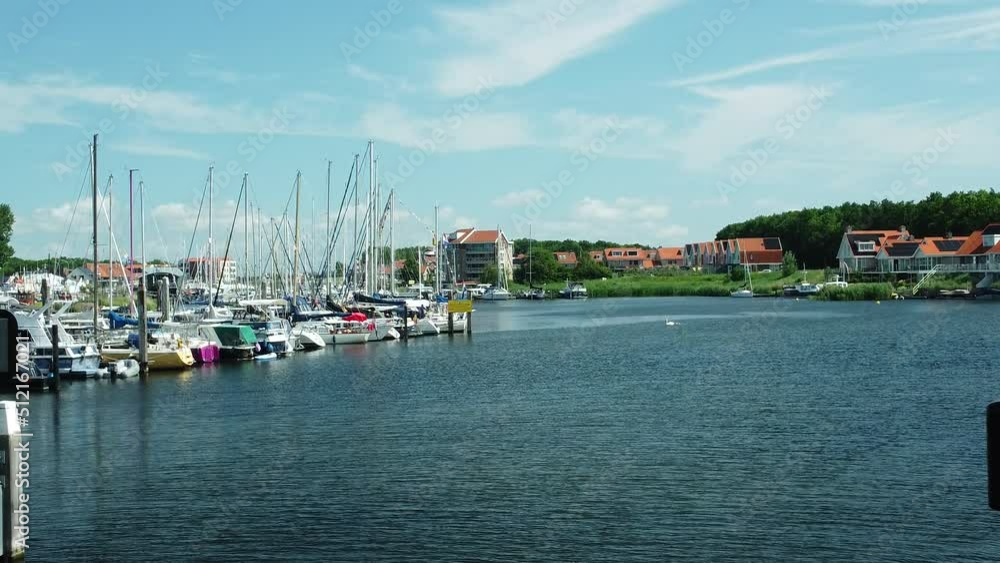 landscape with port marina in city of Tholen in Zeeland the Netherlands landscape with port marina in city of Tholen in Zeeland the Netherlands