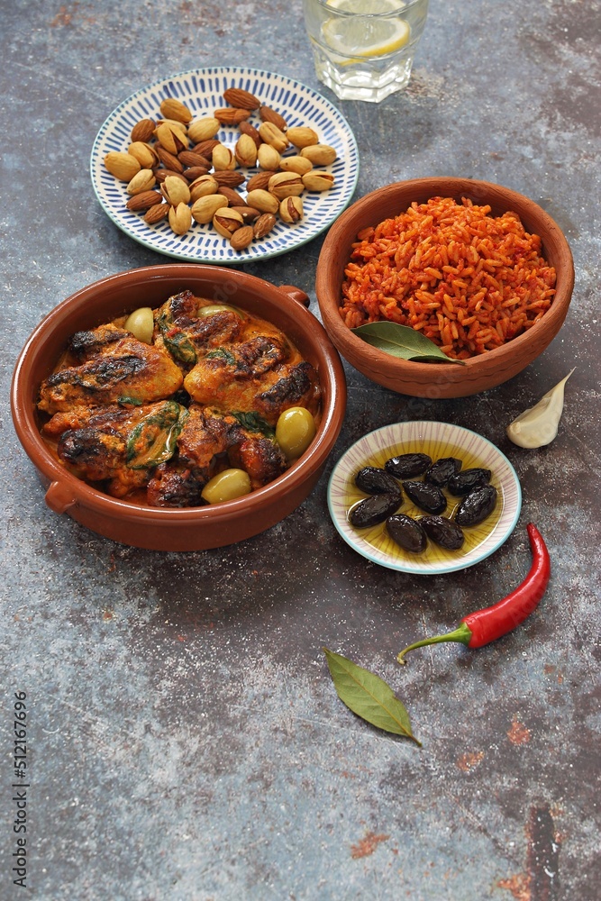 Jollof Rice. Traditional Nigerian spicy rice dish. National Jollof Rice day. Stock Photo Adobe