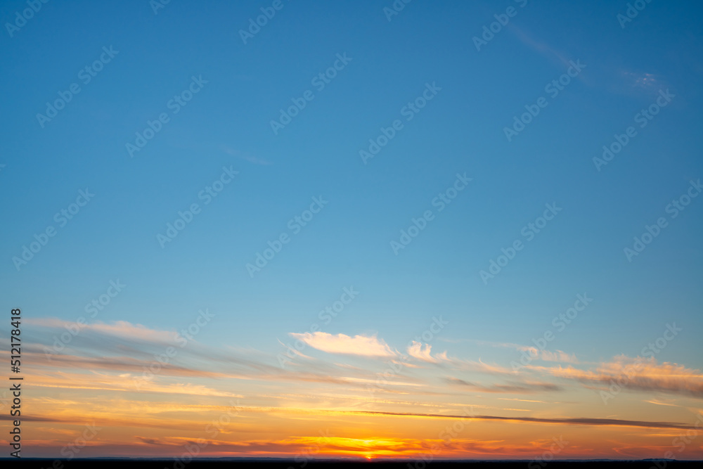 Naklejka premium Fantastic clouds at sunrise