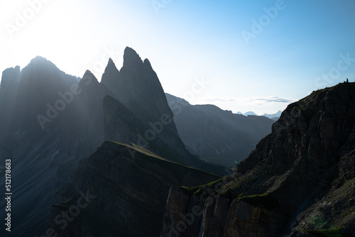 Mountains in a dusty sunrise in summer in the Dolomites, Italy. Landscape with alpine mountain valley.