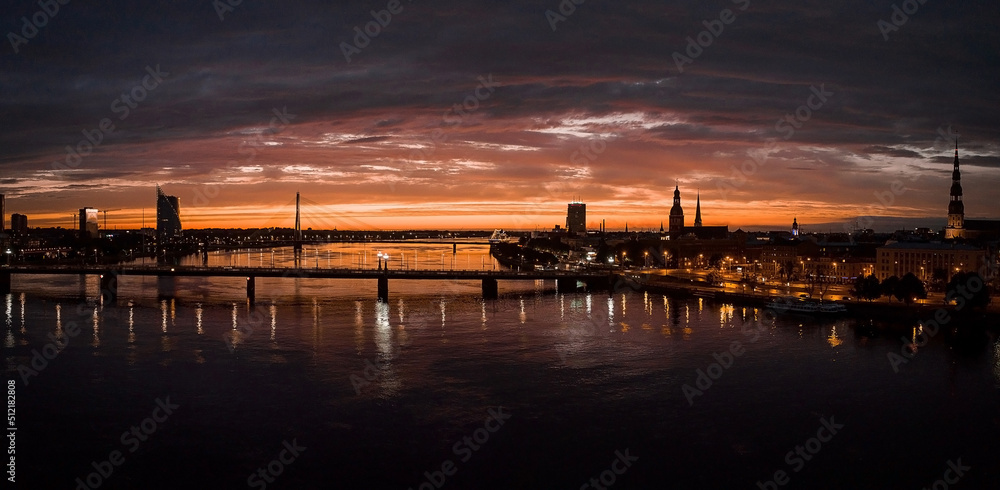 Beautiful aerial view of the sunset over Riga city old town in Latvia. Sunset over Riga.