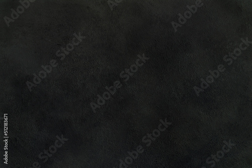 Dark background of decorative plaster with abstract spots. Unusual black or gray wall texture with beautiful patterns, creative surface background. Finishing coating for building cladding.