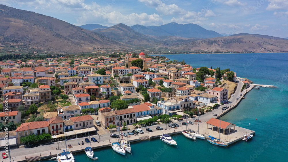 Aerial drone photo from famous and picturesque port of traditional historic village of Galaxidi, Fokida, Greece